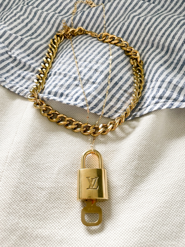 Repurposed vintage brass Louis Vuitton padlock 344 with layered style  necklace chains