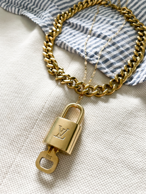 Authentic vintage brass Louis Vuitton lock necklace with custom chains.  Extremely limited production, get one before they're gone. Chain…